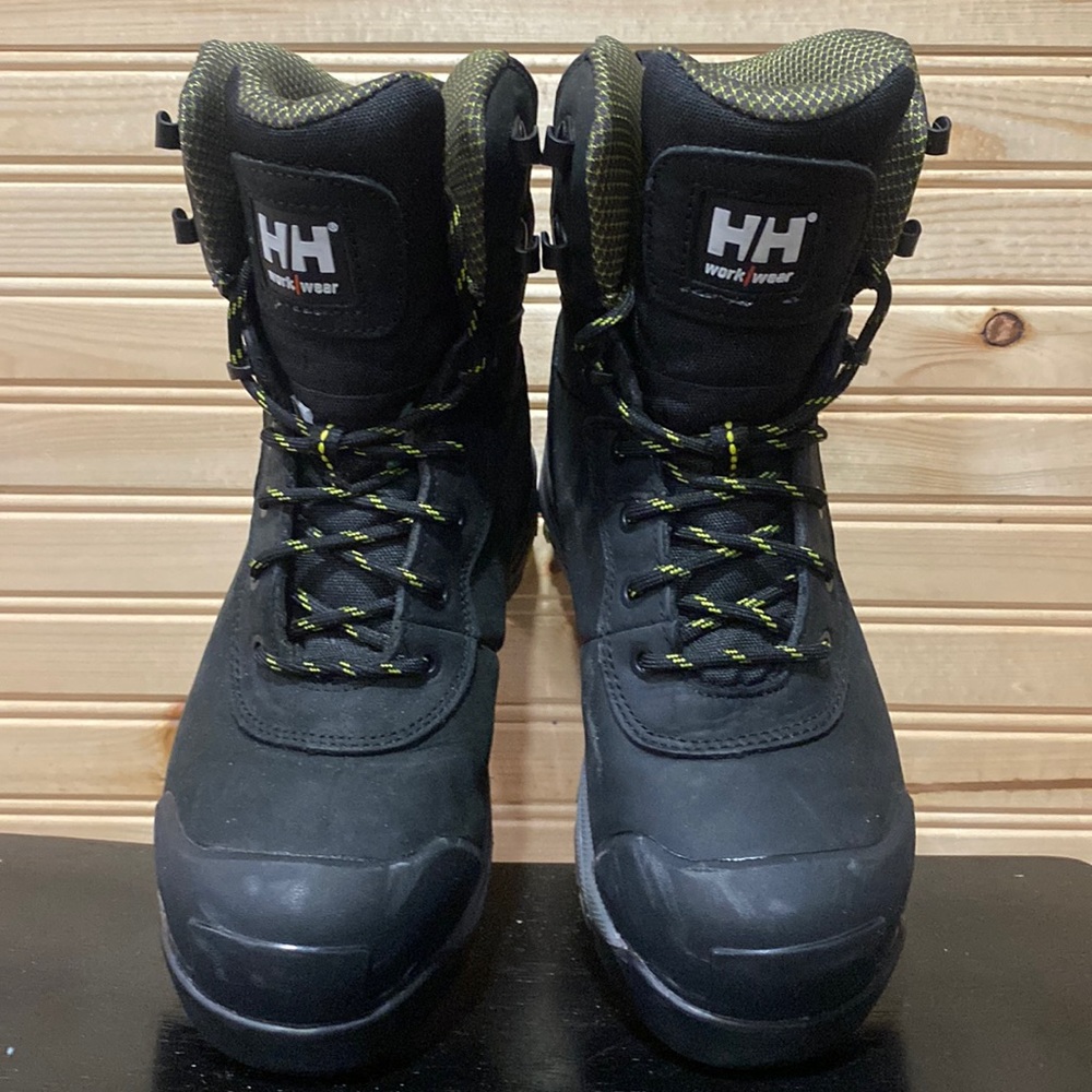 Helly Hanson. Size 7. Black CSA steel toed work boots. T-max insulation.